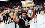 Apple Valley's Gable Steveson (shown celebrating with the Class 3A wrestling team championship trophy in March) won a gold medal at wrestling's junior