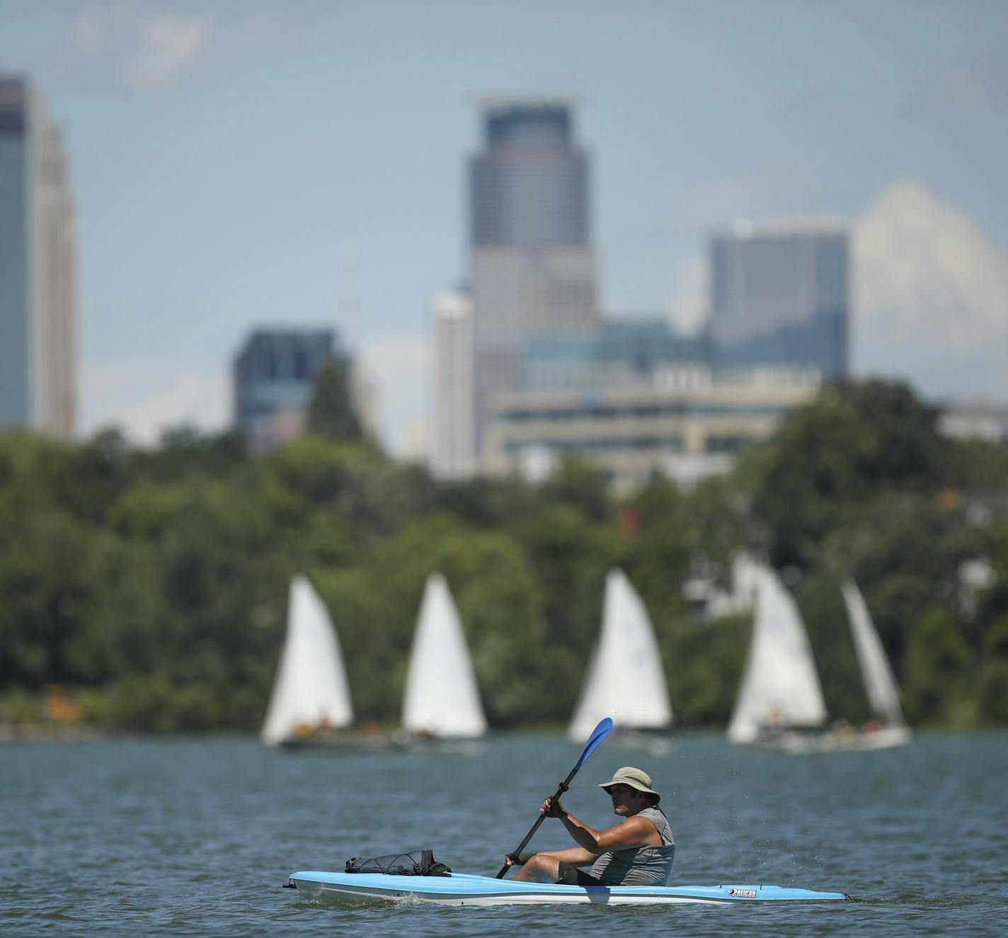 A kayaker paddled across Lake Bde Maka Ska Monday afternoon. ] JEFF WHEELER &#x2022; jeff.wheeler@startribune.com Following the lead of the Minneapolis Park and Recreation Board and the Minnesota Department of Natural Resources, the federal government now recognizes Lake Calhoun as Lake Bde Maka Ska. Swimmers jumped off the raft off Thomas Beach into Lake Bde Maka Ska Monday afternoon, July 16, 2018.