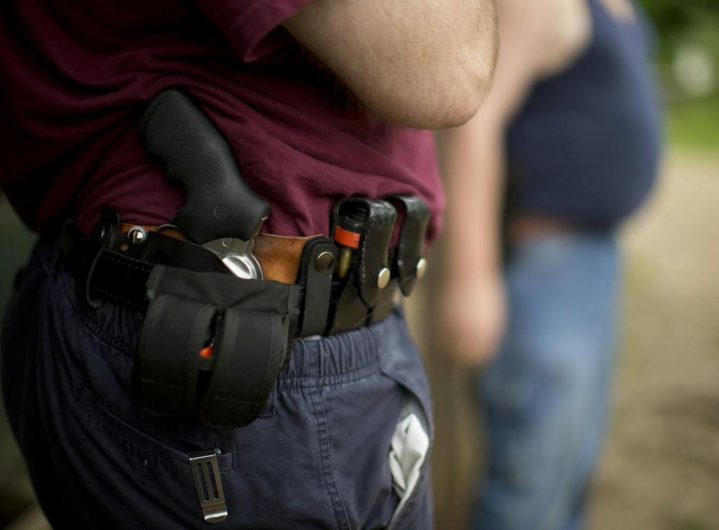 Pat Cannon, 59, of Minneapolis, is representative of the population who have qualified for concealed carry pistol permits in Minnesota. He bought a handgun, got trained and got his permit both for protection and for the enjoyment of shooting in competitions. Wednesday night, June 20, 2012, he shot in a pistol competitive league at the Faribault Rifle & Pistol Club in Kilkenny. Pat Cannon's Ruger revolver was holstered inside his belt while he was between shooting stations in his league on June 2