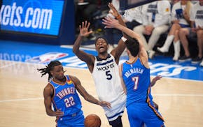 The Timberwolves' Anthony Edwards (5) loses control of the ball in the fourth quarter of Game 5 against the Thunder, after the Wolves had already lost