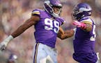 Minnesota Vikings defensive end Danielle Hunter (99) left celebrated with Everson Griffen (97) on his forth quarter sack at U.S Bank Stadium Sunday Oc