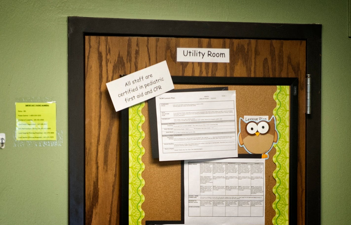 A sign, photographed through a window at Deqo Early Childhood Center in Apple Valley, says "All staff are certified in pediatric first aid and CPR," a fact that may be part of charges against the center.