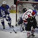 Minnetonka's Jared Ridge tried to assist goalie Paul Ciacco block the puck before Stillwater's Zach Fedie scores the winning point in the last 30 seco