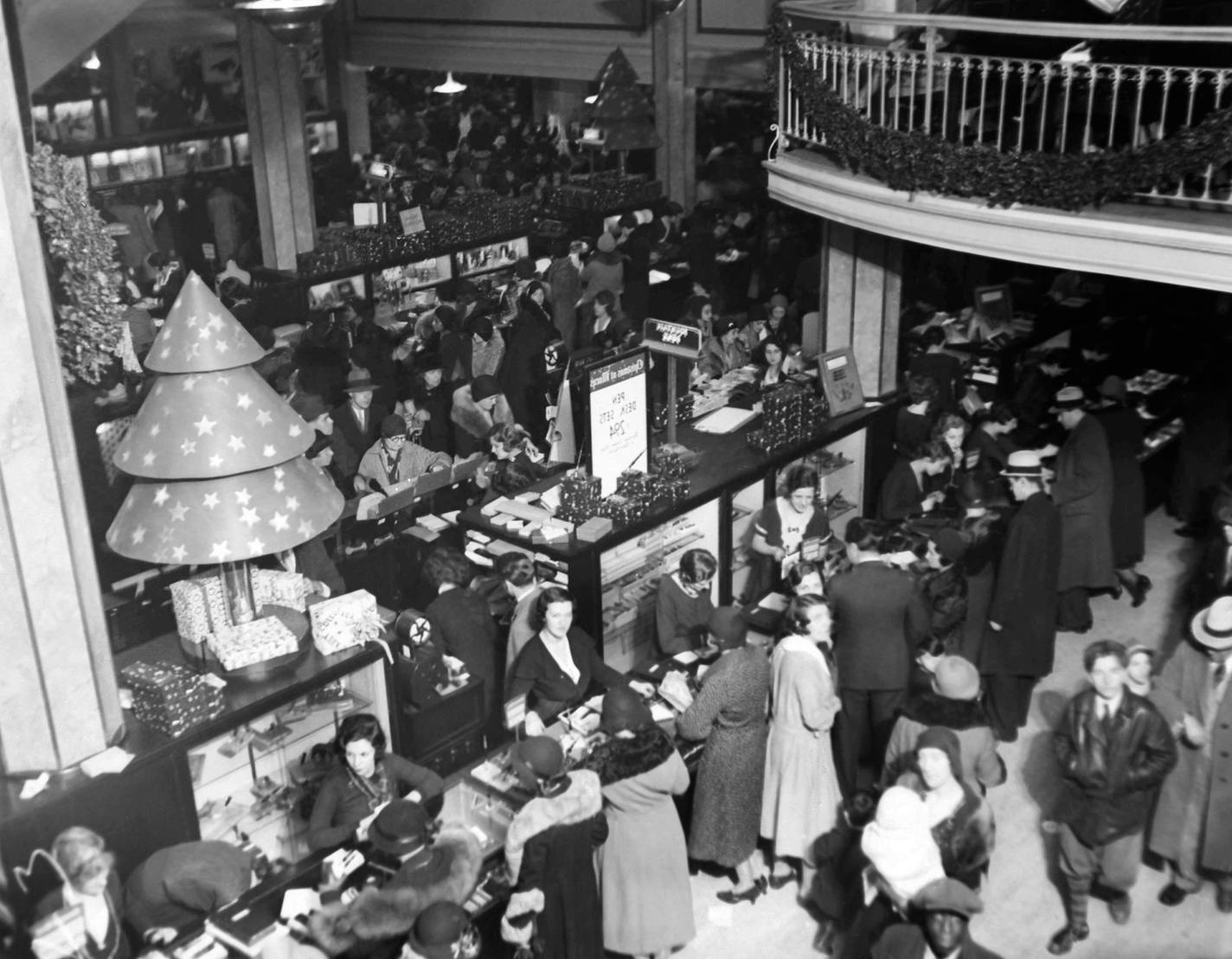 Ground floor of department store Macy's, in New York, on Dec. 11, 1931, with holiday shoppers. (AP Photo) ORG XMIT: APHS188253