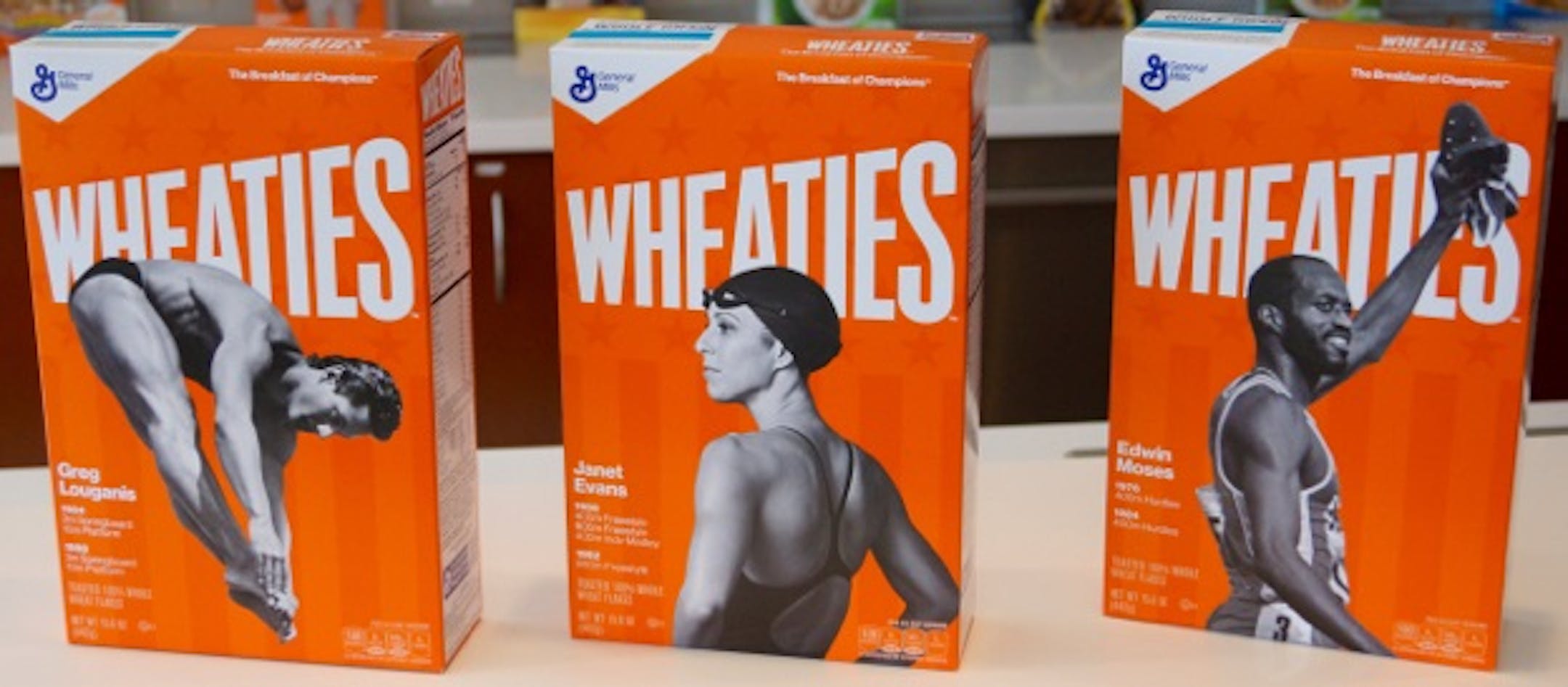 New Wheaties boxes feature Olympic gold medalists Greg Louganis, Janet Evans and Edwin Moses.