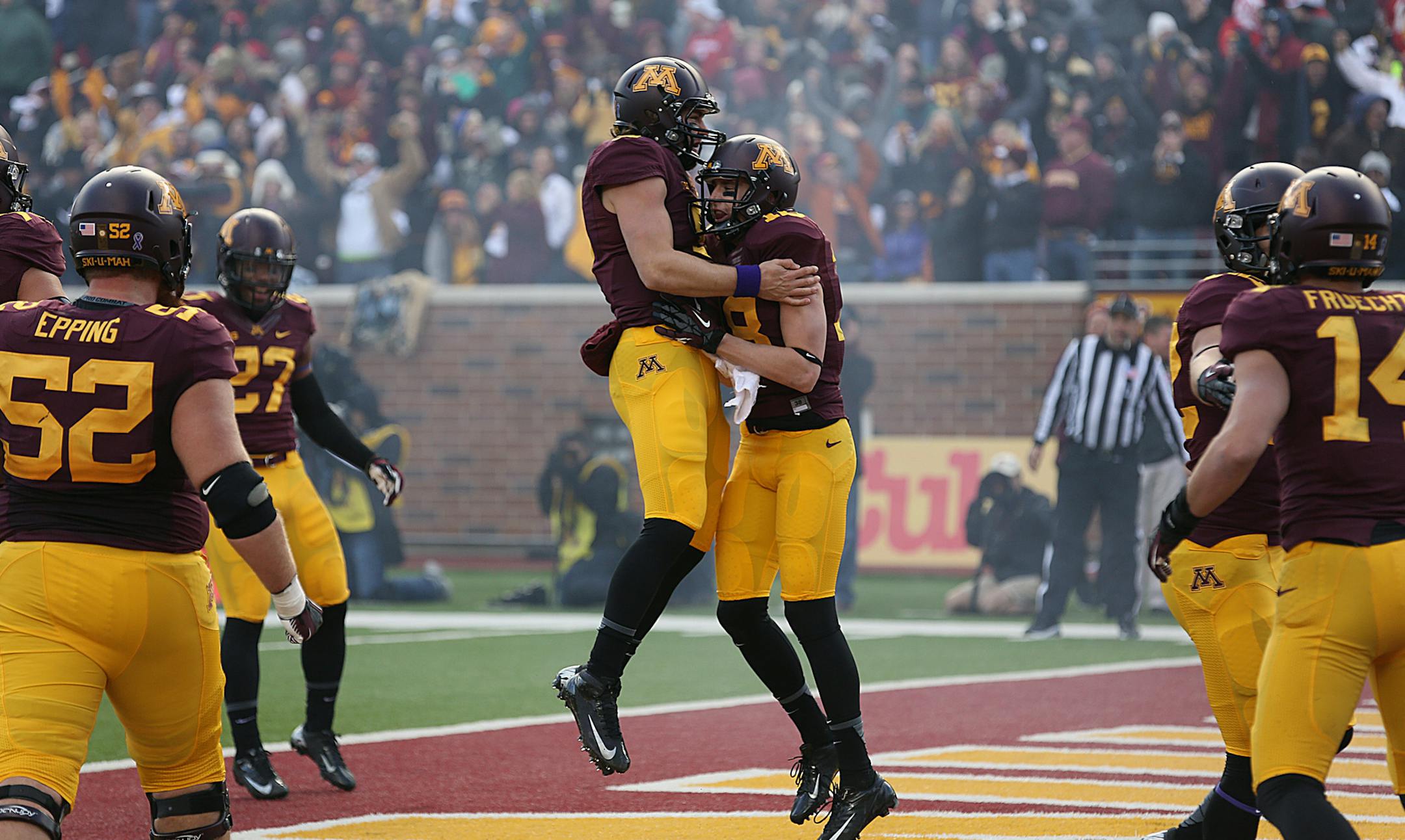 Gopher quarterback Philip Nelson (left) celebrated a second quarter touchdown caught by receiver Derrick Engel.]JIM GEHRZ ‚Ä¢ jgehrz@startribune.com Minneapolis, MN / Oct 27, 2013, 11:00 AM BACKGROUND INFORMATION- The Minnesota Golden Gopher football team played the Nebraska Cornhuskers at TCF Bank Stadium. Minnesota won, 34-23.