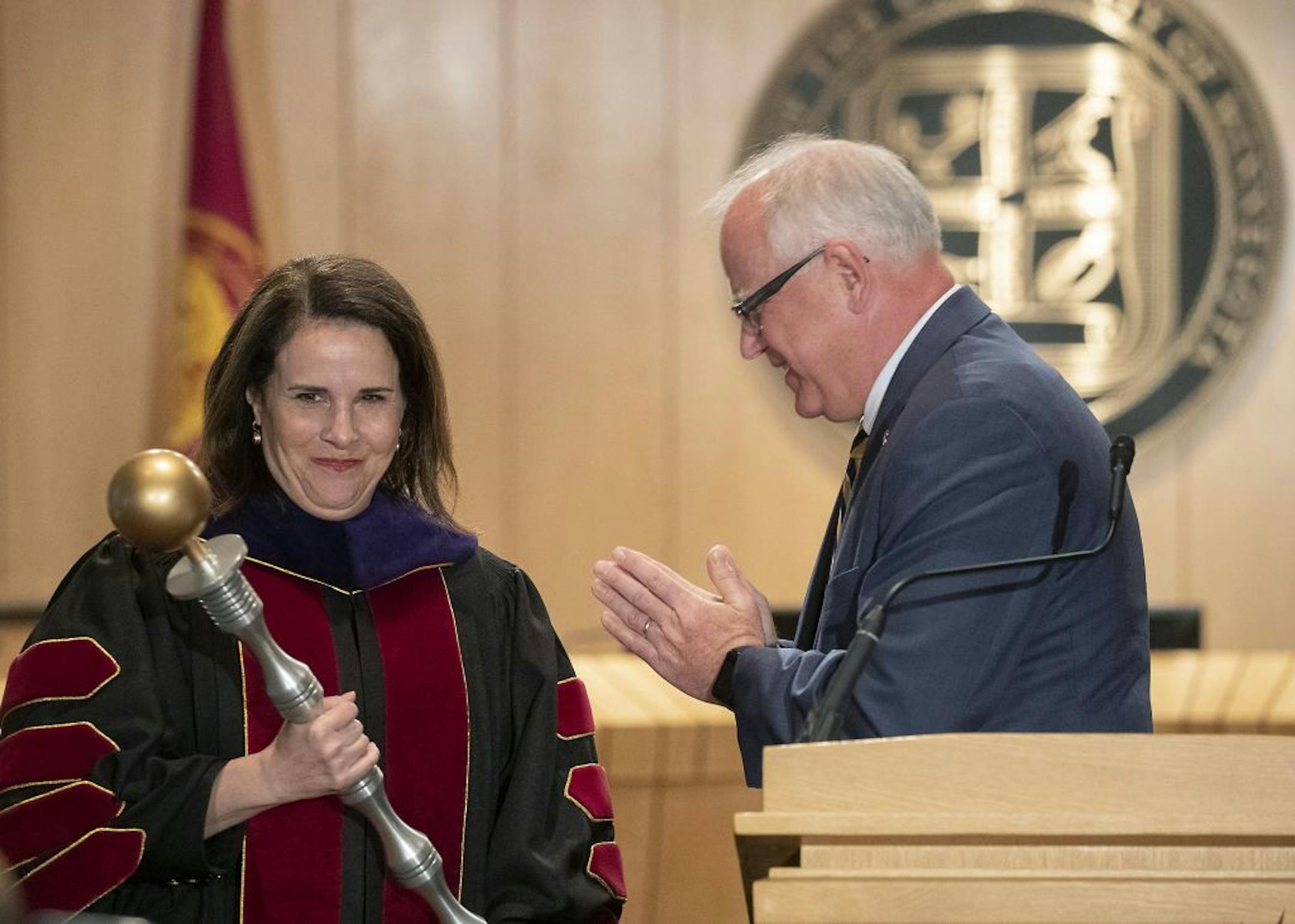 Minnesota Governor Tim Walz handed the mace over to Joan Gabel during an official inauguration ceremony as the University of Minnesota's first female president at McNamara Alumni Center, Friday, September 20, 2019.
