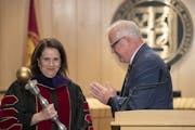 Minnesota Governor Tim Walz handed the mace over to Joan Gabel during an official inauguration ceremony as the University of Minnesota's first female 