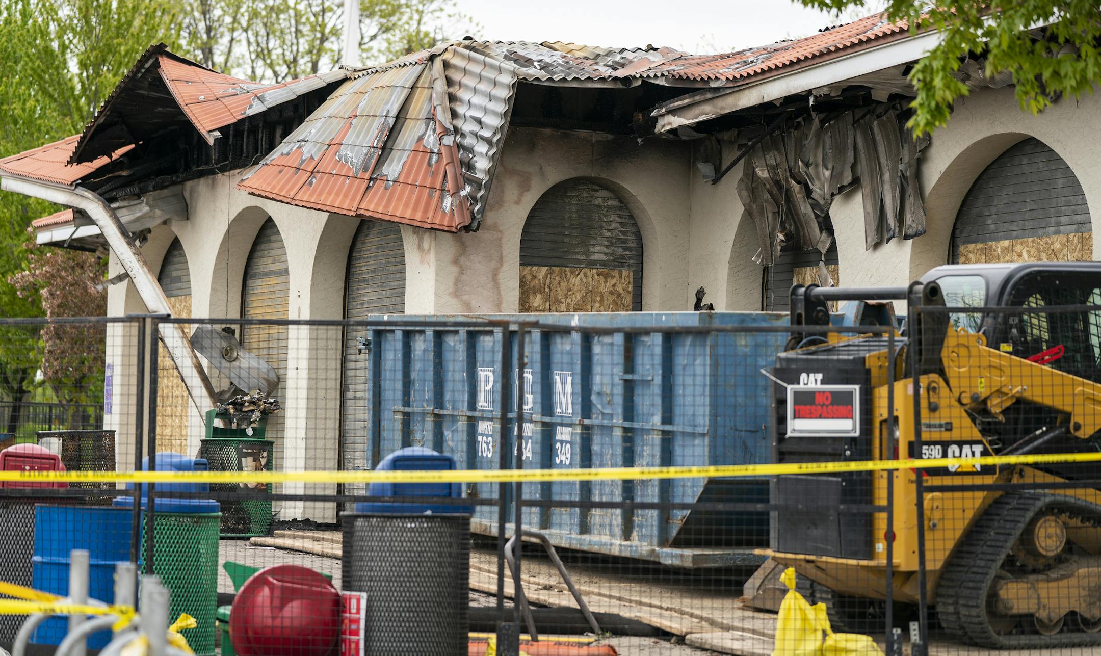 The remains of Lola on the Lake on Bde Maka Ska seen after a fire destroyed it last week. ] LEILA NAVIDI ¥ leila.navidi@startribune.com BACKGROUND INFORMATION: Lola on the Lake on Bde Maka Ska seen after a fire on Tuesday, May 21, 2019. The Minneapolis Fire Department is looking for two people of interest in the fire destroyed the restaurant Lola on the Lake.