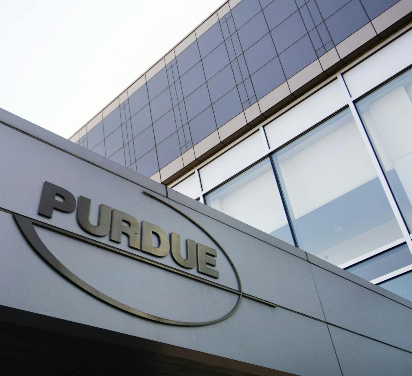 FILE - This Tuesday, May 8, 2007 file photo shows the Purdue Pharma offices in Stamford, Conn. In 2007, the company pleaded guilty and agreed to pay more than $600 million in fines for misleading the public about the risks of OxyContin. But the drug continued to rack up blockbuster sales. (AP Photo/Douglas Healey, File)