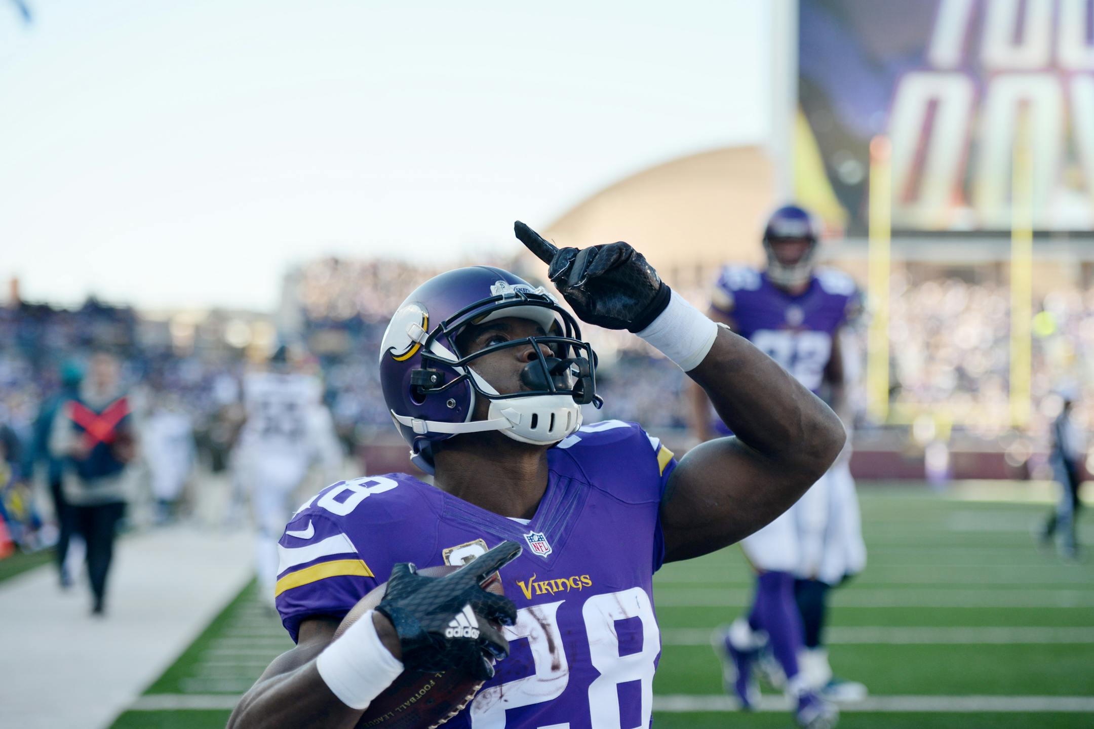 Vikings running back Adrian Peterson celebrated after scoring a touchdown against the Rams