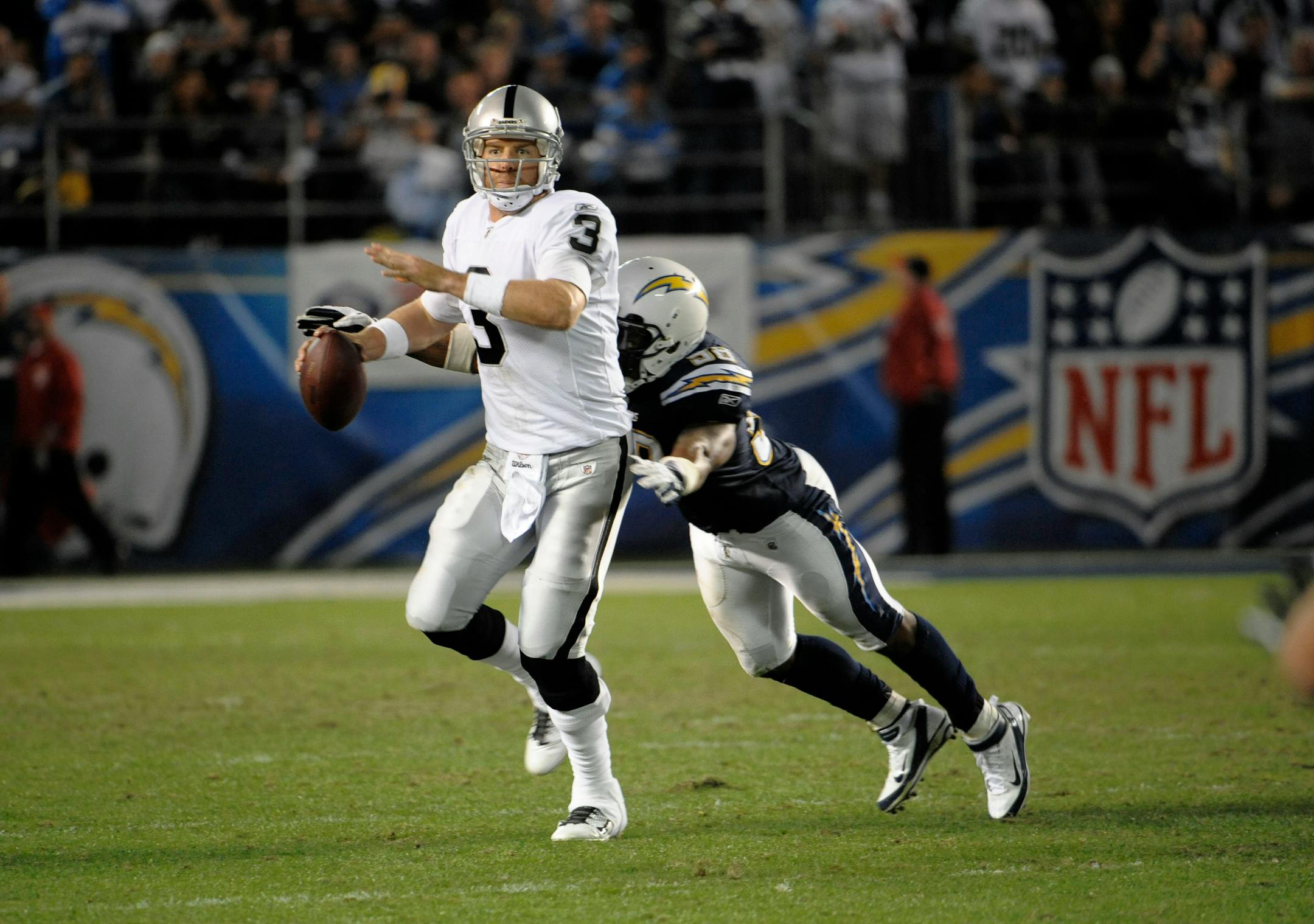 Oakland Raiders quarterback Carson Palmer (3) plays during an NFL football game against the San Diego Chargers Thursday, Nov. 10, 2011, in San Diego. (AP Photo/Denis Poroy)