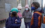 Students wearing masks arrived at Morton School in Manhattan, on Jan. 4, 2022. 
