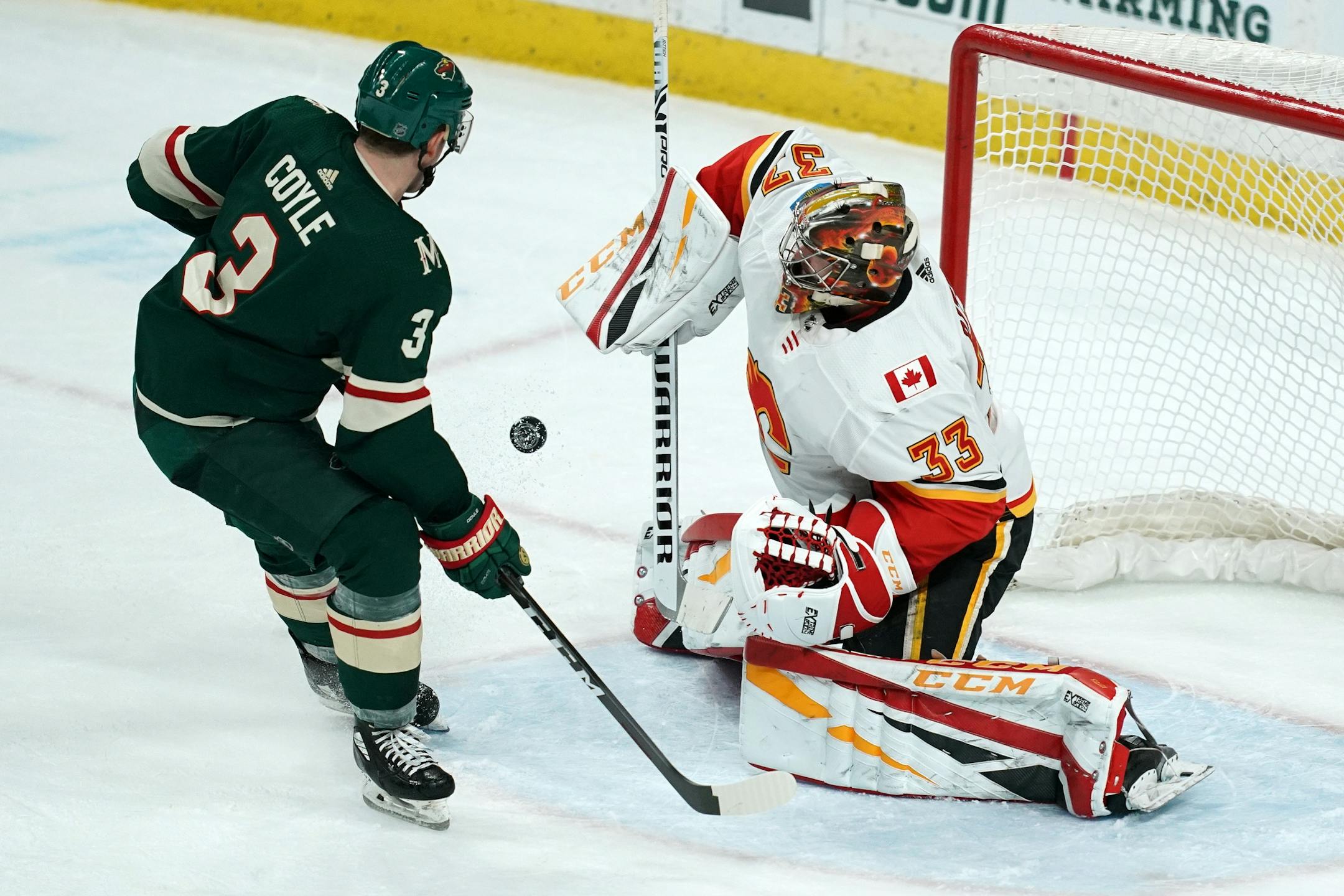 Wild center Charlie Coyle shot wide on Calgary goaltender David Rittich earlier this month.