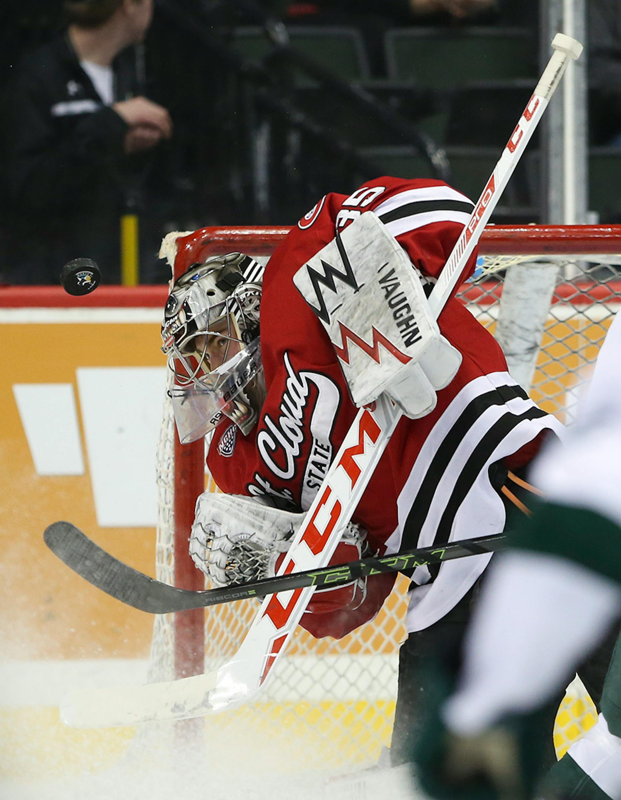 Huskies goalie Charlie Lindgren (35) with a second period save Sunday afternoon.