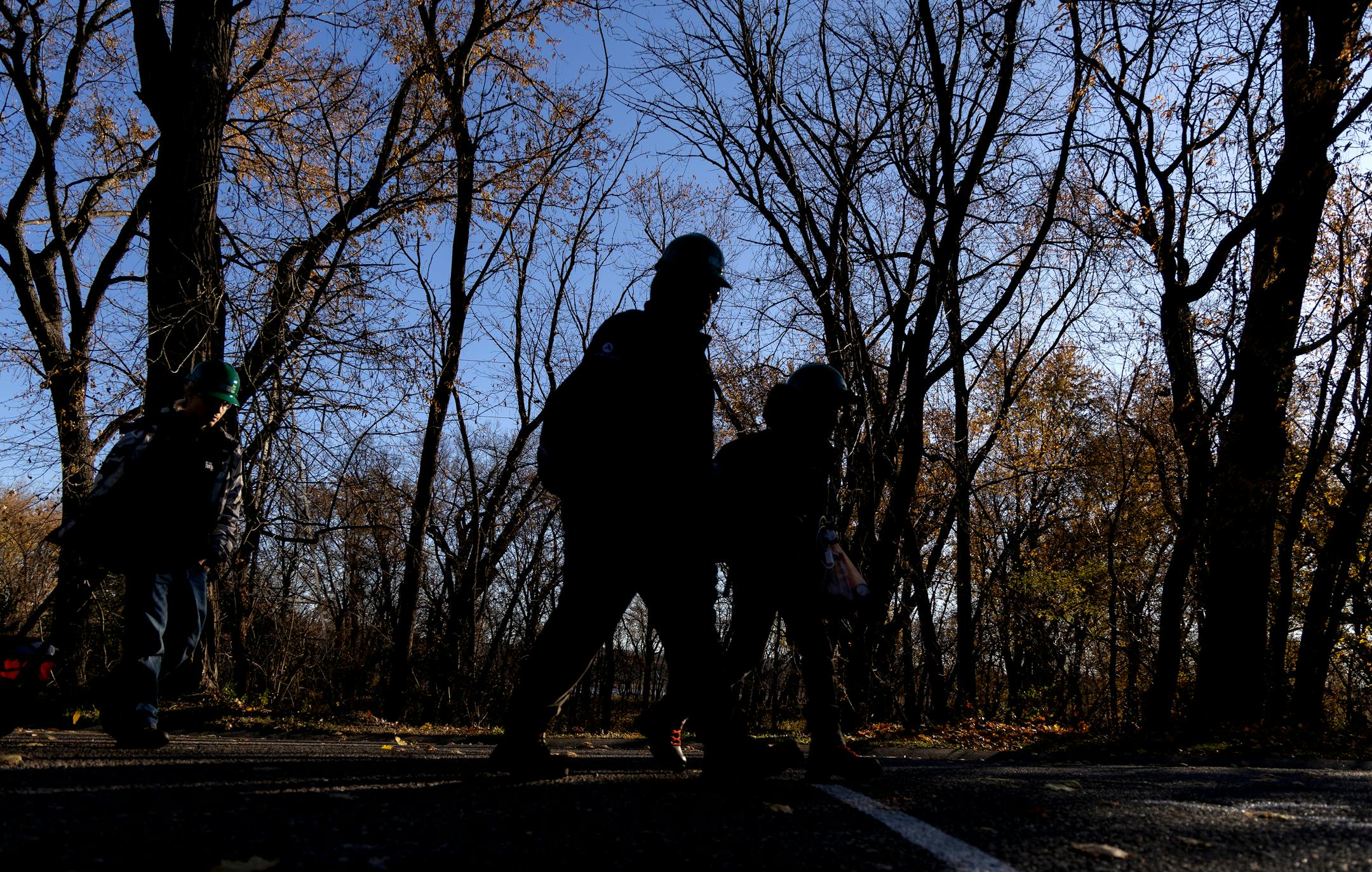 Minnesota Energy Climate Corps team members walk up to a park building do an energy audit Thursday, November 9, 2023, at Fort Snelling State Park in St. Paul, Minn. ] CARLOS GONZALEZ • carlos.gonzalez@startribune.com