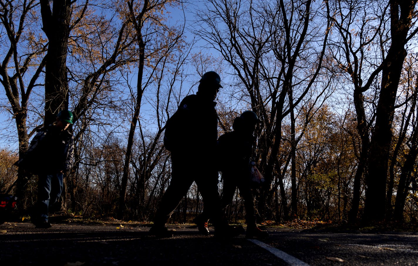 Minnesota Energy Climate Corps team members walk up to a park building do an energy audit Thursday, November 9, 2023, at Fort Snelling State Park in St. Paul, Minn. ] CARLOS GONZALEZ • carlos.gonzalez@startribune.com