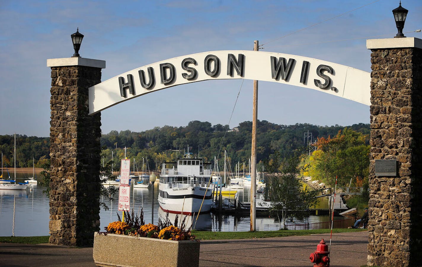 Hudson, Wis., has seen a surge in visitors from Minnesota, where dining and drinking have been banned inside bars and restaurants because of the coronavirus pandemic.