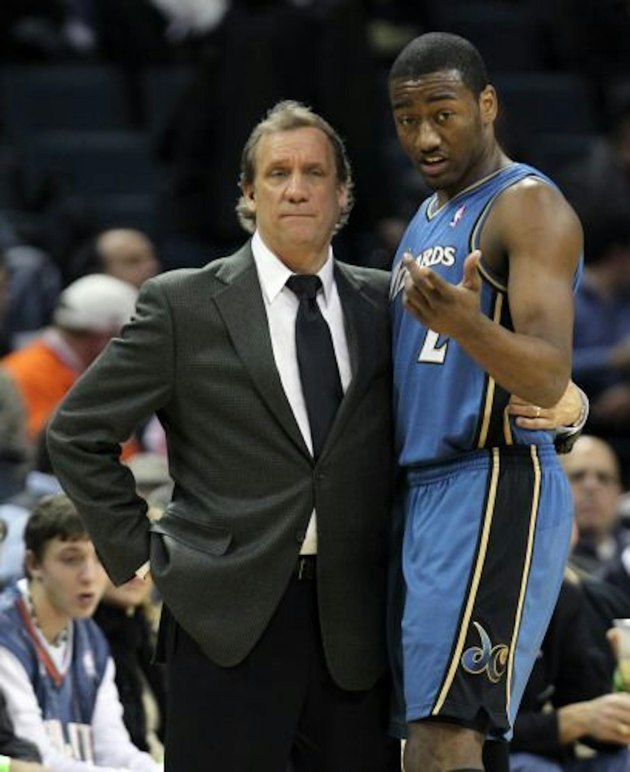Wizards coach Flip Saunders listened to point guard John Wall.