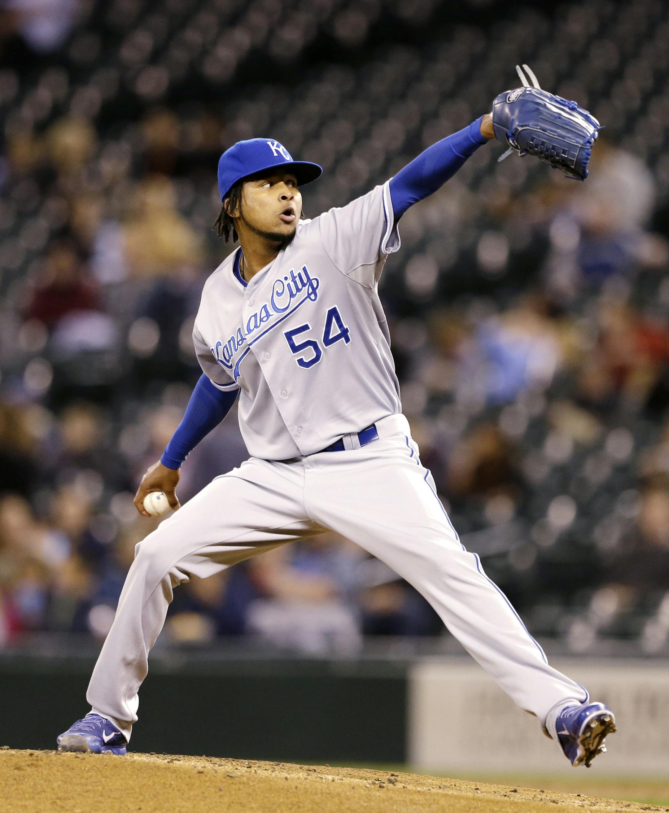 Kansas City Royals starting pitcher Ervin Santana throws to a Seattle Mariners batter in the first inning of a baseball game Wednesday, Sept. 25, 2013, in Seattle. (AP Photo/Elaine Thompson) ORG XMIT: MIN2013110618433879
