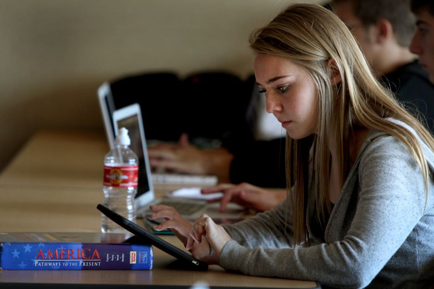 Grace Kerber, 15, worked from her ipad during her Hybrid Health Class at Lakeville South High School, Tuesday, September 18, 2012. Lakeville school district is experimenting this year with hybrid or flipped classrooms where students do the course work at home and the homework at school. (ELIZABETH FLORES/STAR TRIBUNE) ELIZABETH FLORES � eflores@startribune.com