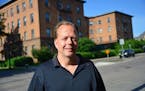 Steve Frenz, shown with an apartment building on Franklin Avenue in south Minneapolis. Thousands of tenants could be affected if the city strips Frenz
