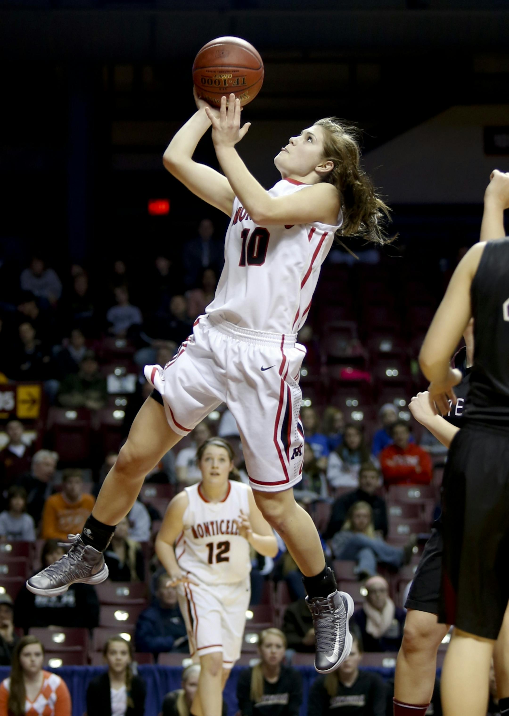 Monticello's Grace Sawatzke went to the basket for a layup during the first half of class 3A quarterfinals at Williams Arena in Minneapolis, Min., Wednesday, March 13, 2013.