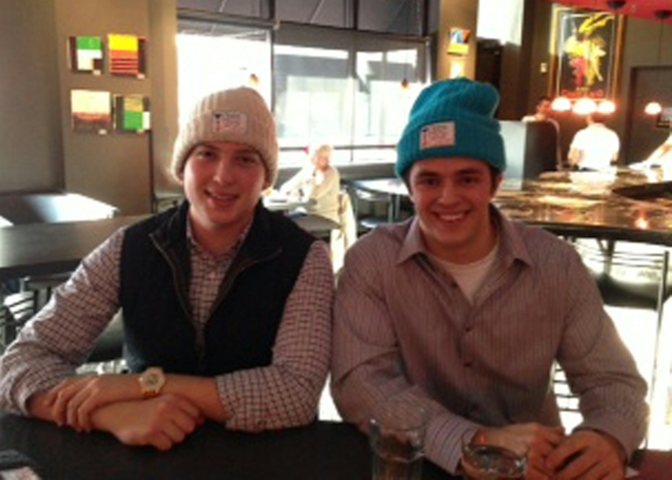 University of St. Thomas business students Zach Quinn (in white cap) and Brian Keller (in turquoise) created Love Your Melon hats for kids facing cancer NOTE VERY LOW RES FILE SIZE - BEWARE OF USING LARGE