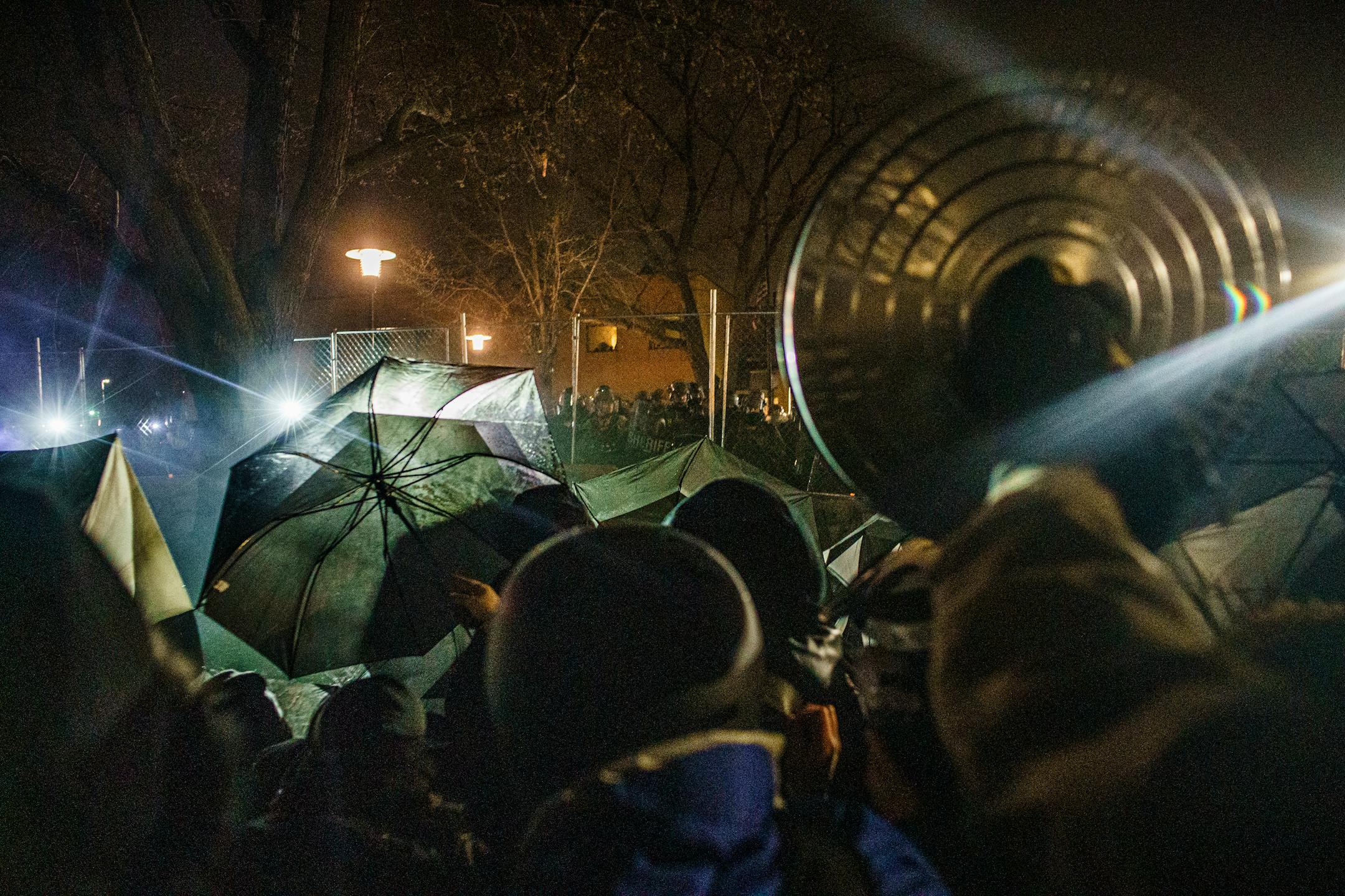 People protest near the Brooklyn Center Police Department in response to the fatal police shooting of Daunte Wright, Wednesday, April 14, 2021 in Brooklyn Center, Minn.