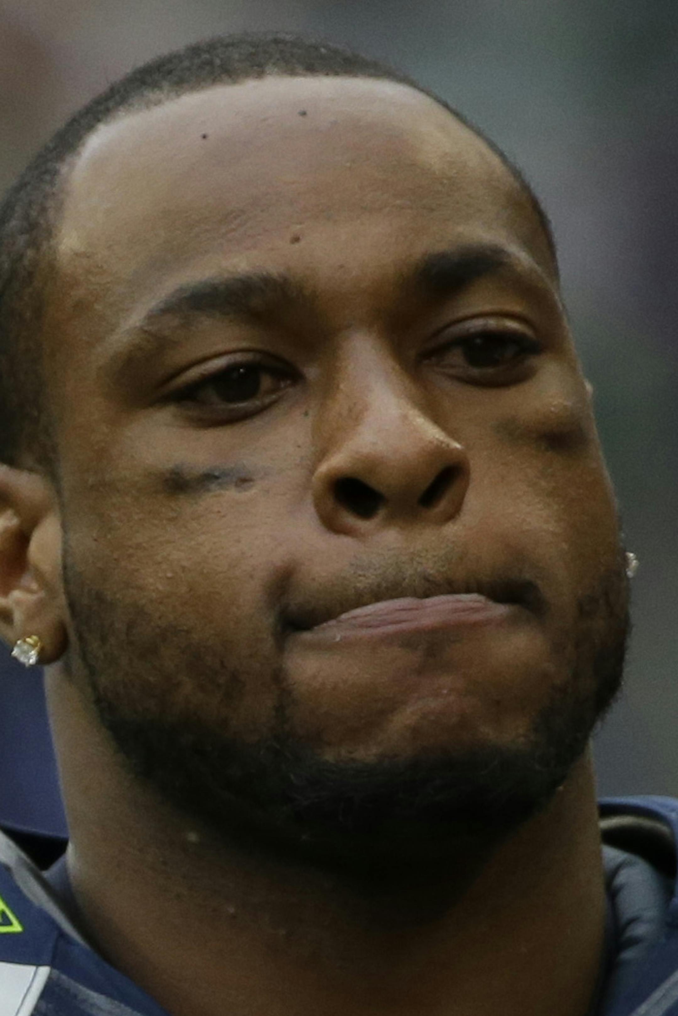Seattle Seahawks wide receiver Percy Harvin stands on the sideline late in the second half of the Seattle Seahawks' 30-23 loss to the Dallas Cowboys in an NFL football game, Sunday, Oct. 12, 2014, in Seattle. (AP Photo/Elaine Thompson) ORG XMIT: OTK