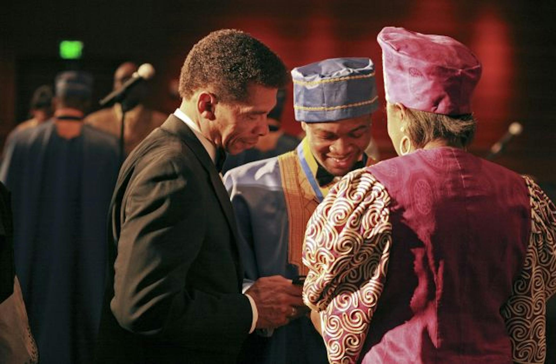 Jason Steele, center, greets his parents, J.D.(Steele), left and CeLois ( Steele) right.
