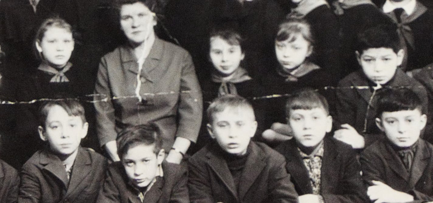 Mark Stipakov, second from right, second row, a real estate agent in Plymouth, went to grade school with Russian President Vladimir Putin, third from right, front row.