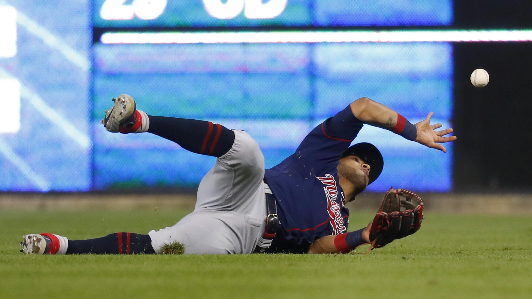 Minnesota Twins left fielder Eddie Rosario (20) catches a Detroit Tigers' Willi Castro fly ball in the eighth inning of a baseball game in Detroit, Wednesday, Sept. 25, 2019.