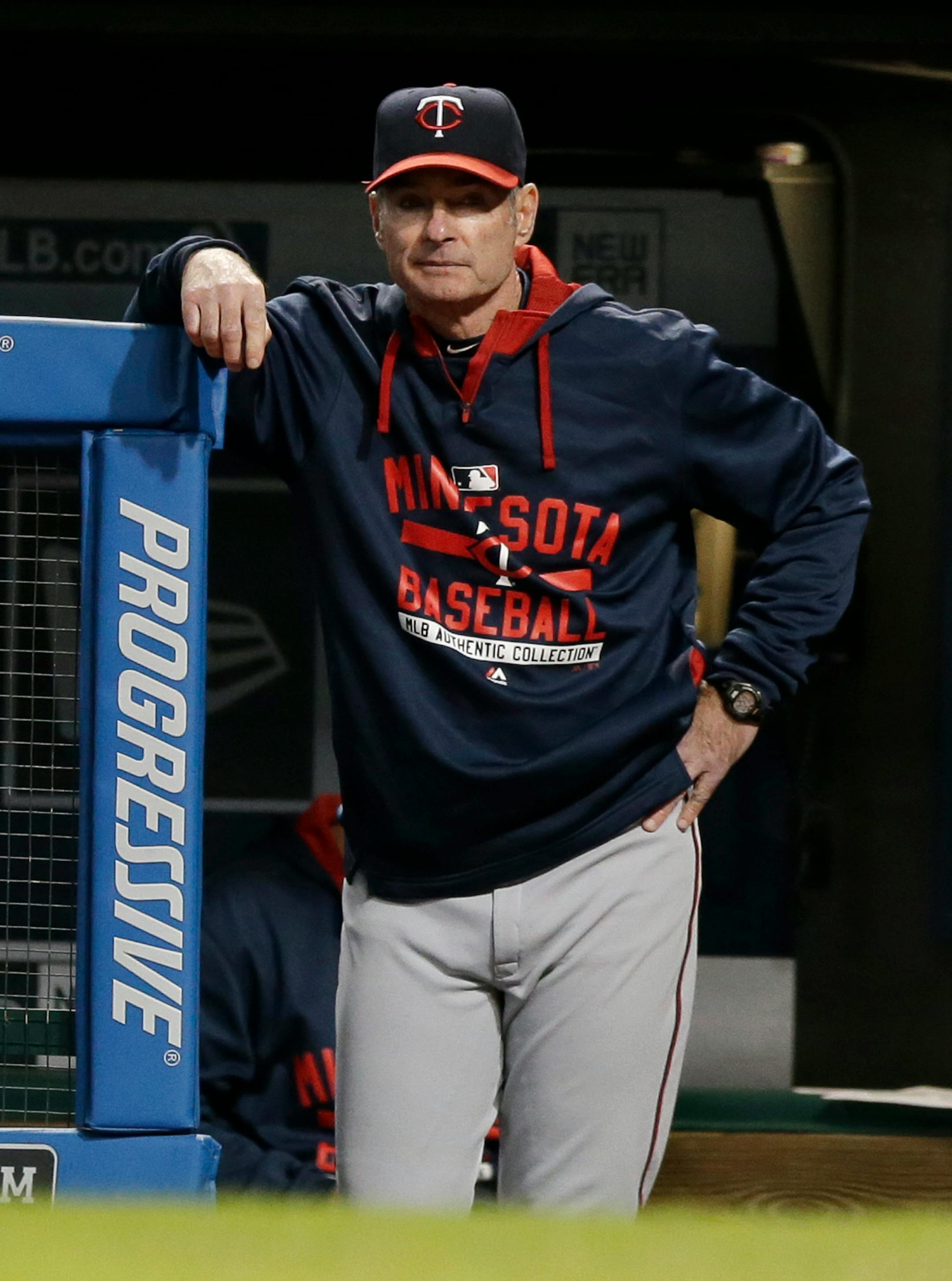 Minnesota Twins manager Paul Molitor watches in the first inning of the second baseball game of a doubleheader against the Cleveland Indians, Wednesday, Sept. 30, 2015, in Cleveland. (AP Photo/Tony Dejak)