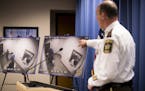 Sheriff Rich Stanek points to surveillance footage of ICE detaining two individuals as they were released from jail in defense of Hennepin County afte