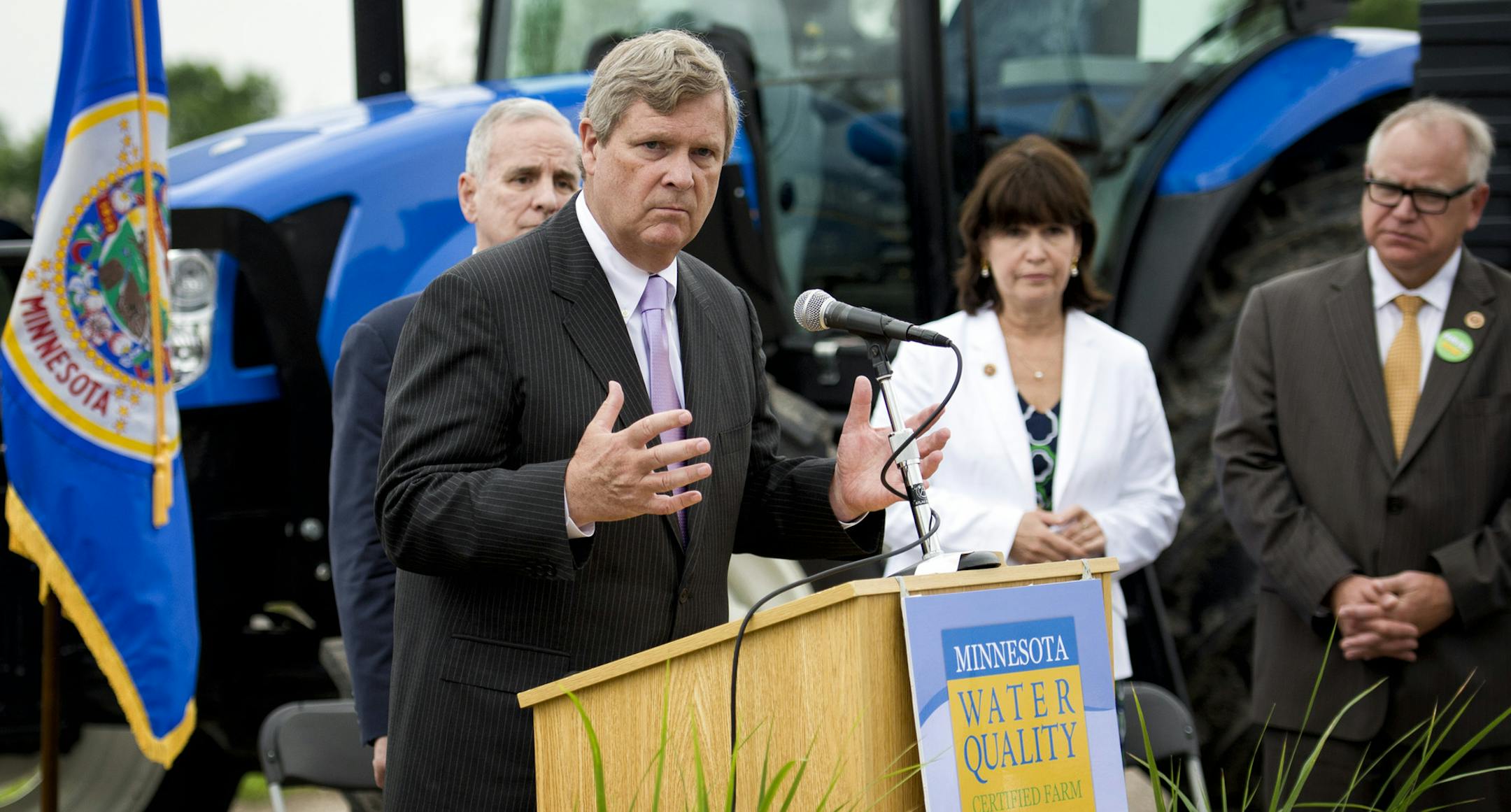 Agriculture Secretary Tom Vilsack came to Minnesota as he and Governor Mark Dayton launched a new water quality pilot program for the state's farmers Monday, June 10, 2013 Behind him are Governor Mark Dayton, Rep. Betty McCollum and Rep. Tim Walz ] GLEN STUBBE * gstubbe@startribune.com
