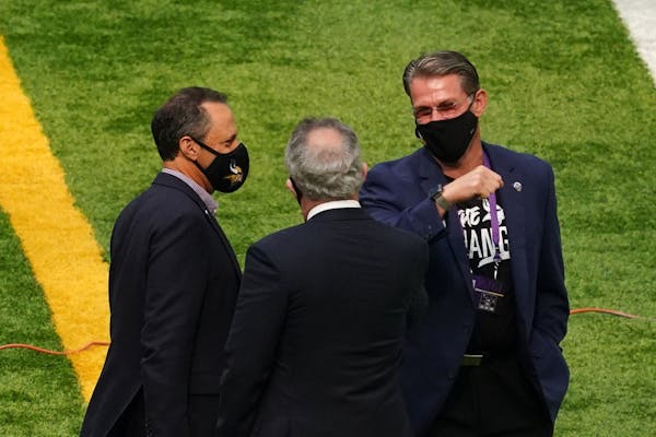 Vikings team president Mark Wilf, chairman Zygi wilf, and general manager Rick Spielman greeted each other on the sidelines. ] ANTHONY SOUFFLE • ant