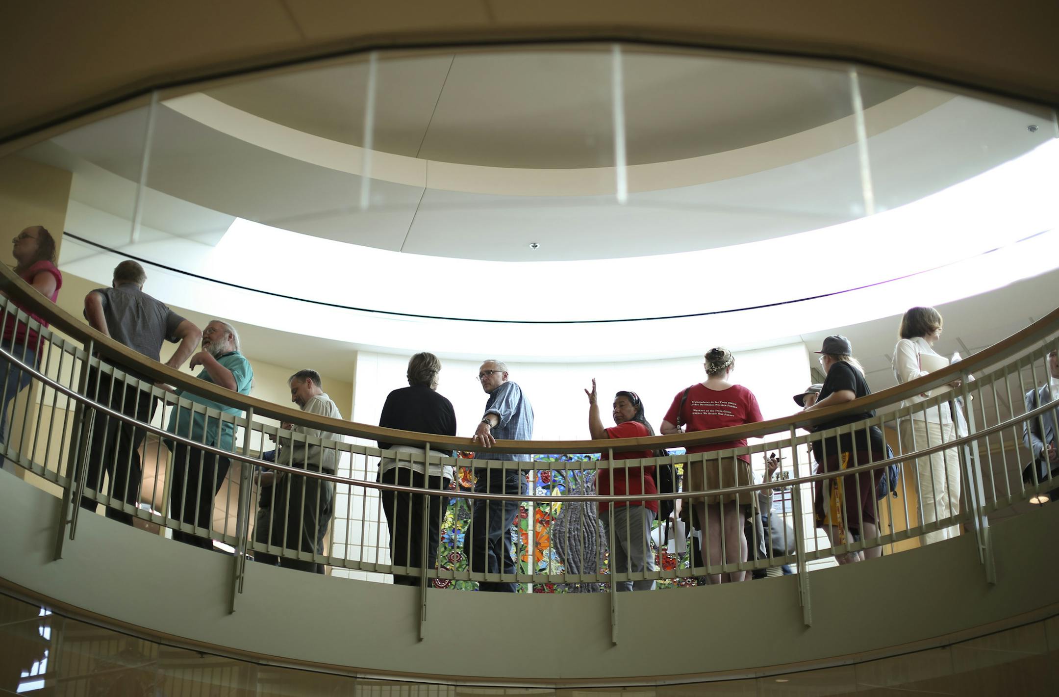 People waited to get into the room where the St. Paul HREEO Commission was holding a public hearing for comment on the proposed ESST ordinance Tuesday night at Neighborhood House on St. Paul's West Side. ] JEFF WHEELER ï jeff.wheeler@startribune.com The St. Paul Human Rights & Equal Employment Opportunity Commission held their first meeting for public comment on the proposed Earned Sick and Safe Time ordinance Tuesday evening, June 21, 2016 at Neighborhood House in St. Paul.