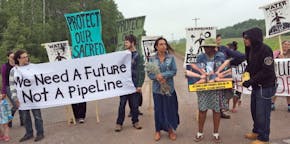 Winona Laduke? and others demonstrate at a rally held at the Wisconsin-Minnesota border on the morning after Line 3 is approved, Friday, June 29, 2018