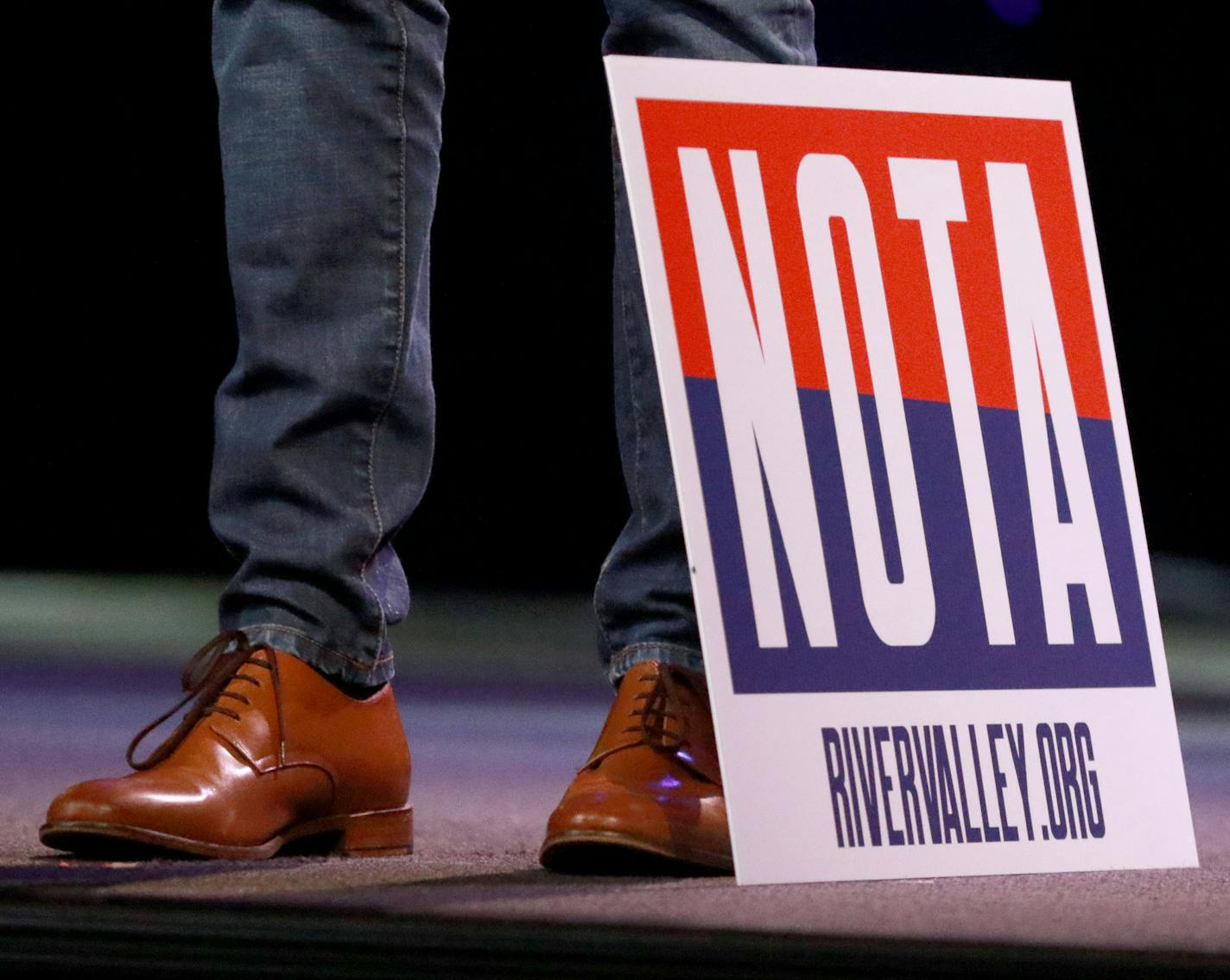 Campus pastor Brandon Liebe uses a sign to introduce the coming topic of None of the Above, related to the presidential choices in the upcoming election at the evangelical church service at River Valley Church Saturday, Oct. 8, 2016, in Apple Valley, MN.](DAVID JOLES/STARTRIBUNE)djoles@startribune.com Bryan Moak has never seen an election like this. Worshippers at his evangelical church in Bloomington are wary about both presidential candidate, and are grappling with what to do in the ballot boo