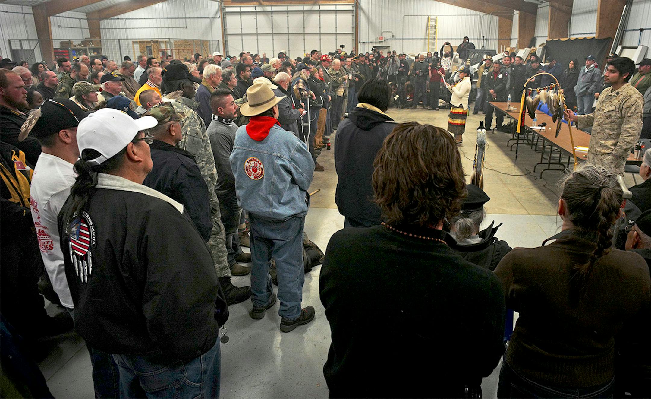Veterans march coodinator Brenda White Bull addressed several hundred veterans at Sitting Bull College in Fort Yates, N.D., on Sunday, Dec. 4.