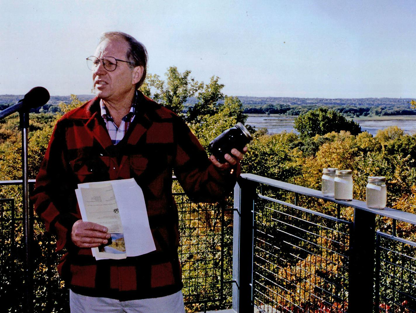 In 1992, Gov. Arne Carlson announced an effort to to clean up the Minnesota River. Carlson held a sample of dirty river water collected after a heavy rain, the result of runoff.