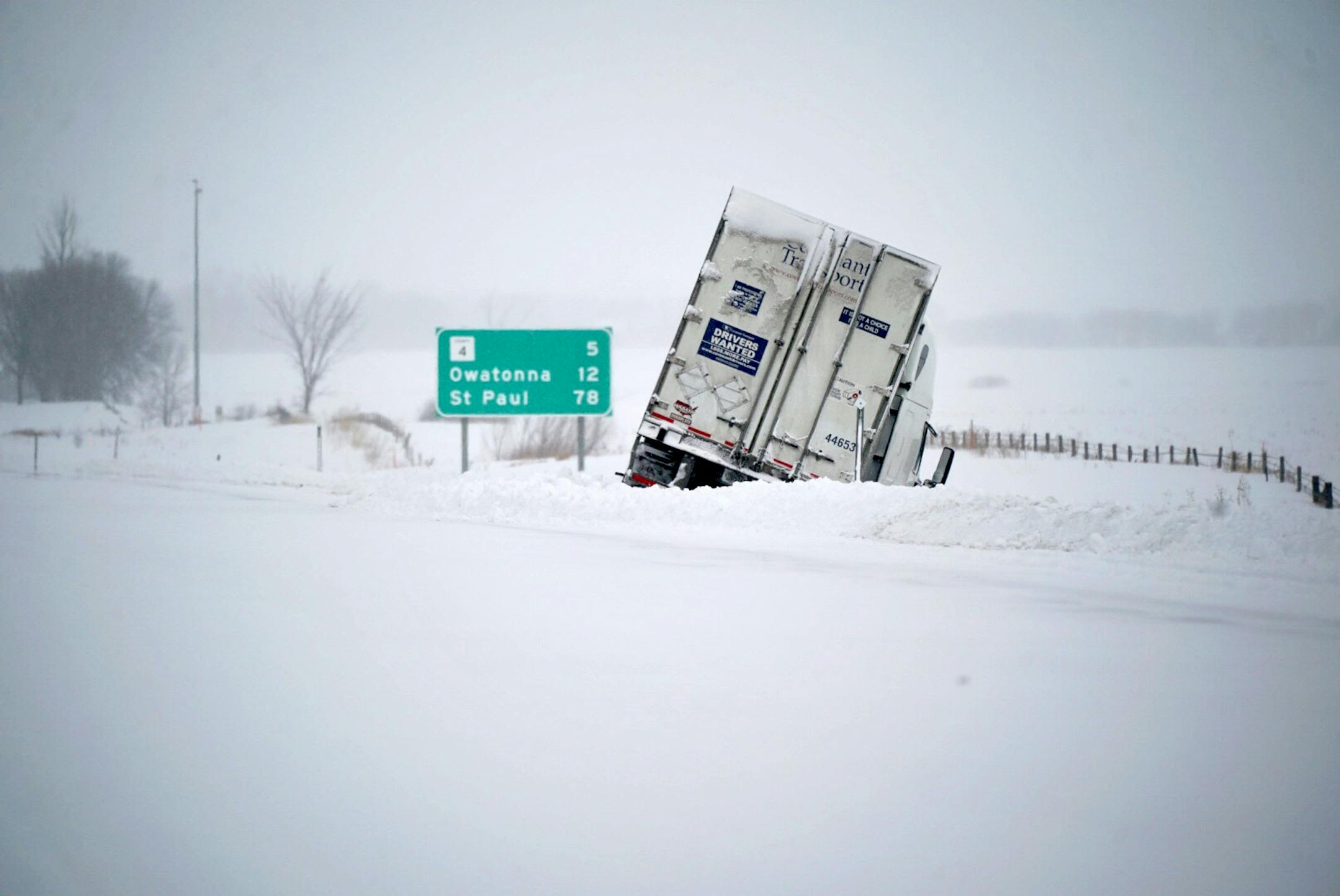 Highway I-35 south of Owatonna, Minn., was still closed as MnDOT officials worked to clear it and searched for stranded travelers early Monday.