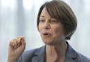 U.S. Sen. Amy Klobuchar has seen some criticism of her tough record as a Hennepin County prosecutor. Above: Klobuchar spoke to voters at a campaign st