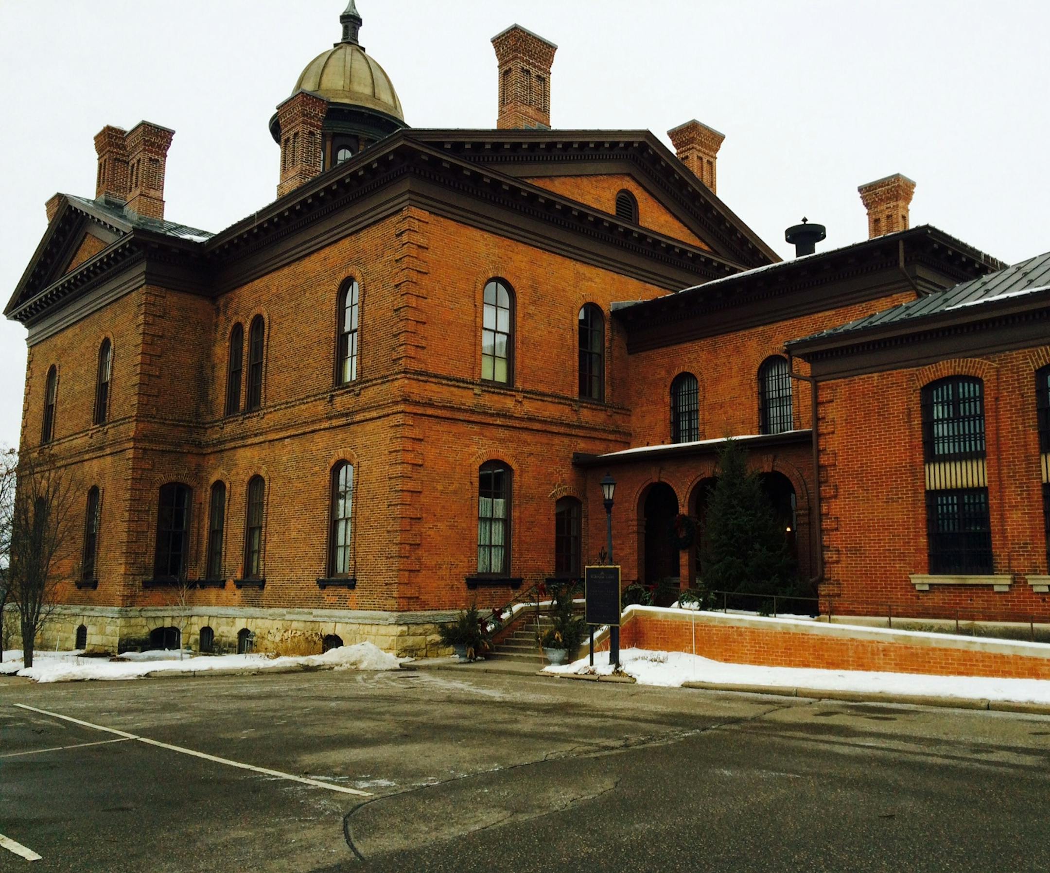 Historic Courthouse, seen from the back, shows the county's original jail at right.