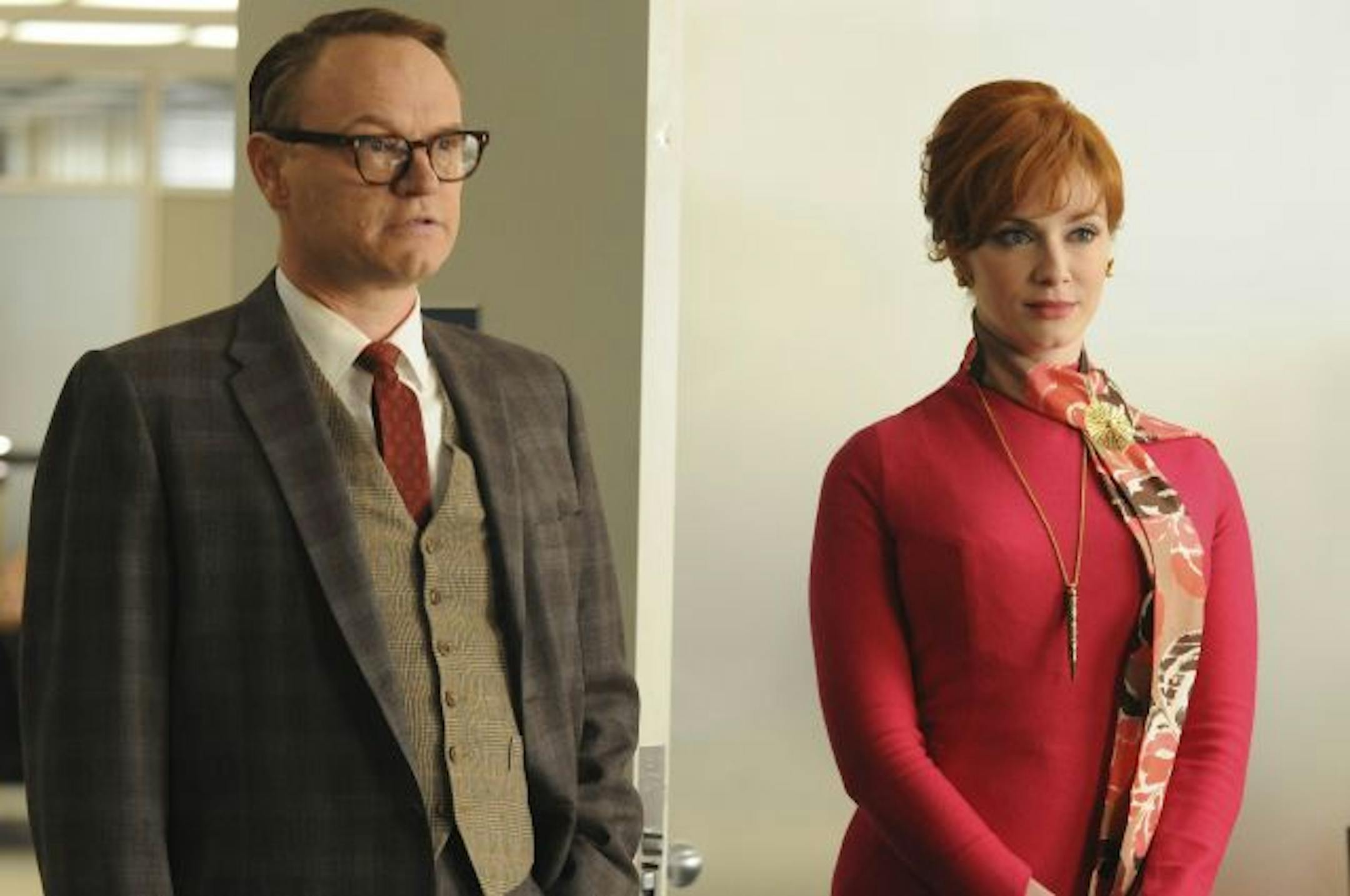 Lane Pryce (Jared Harris) and Joan Harris (Christina Hendricks) may not shop at the same department store, but they're allies in the new office of Sterling Cooper Draper Pryce.