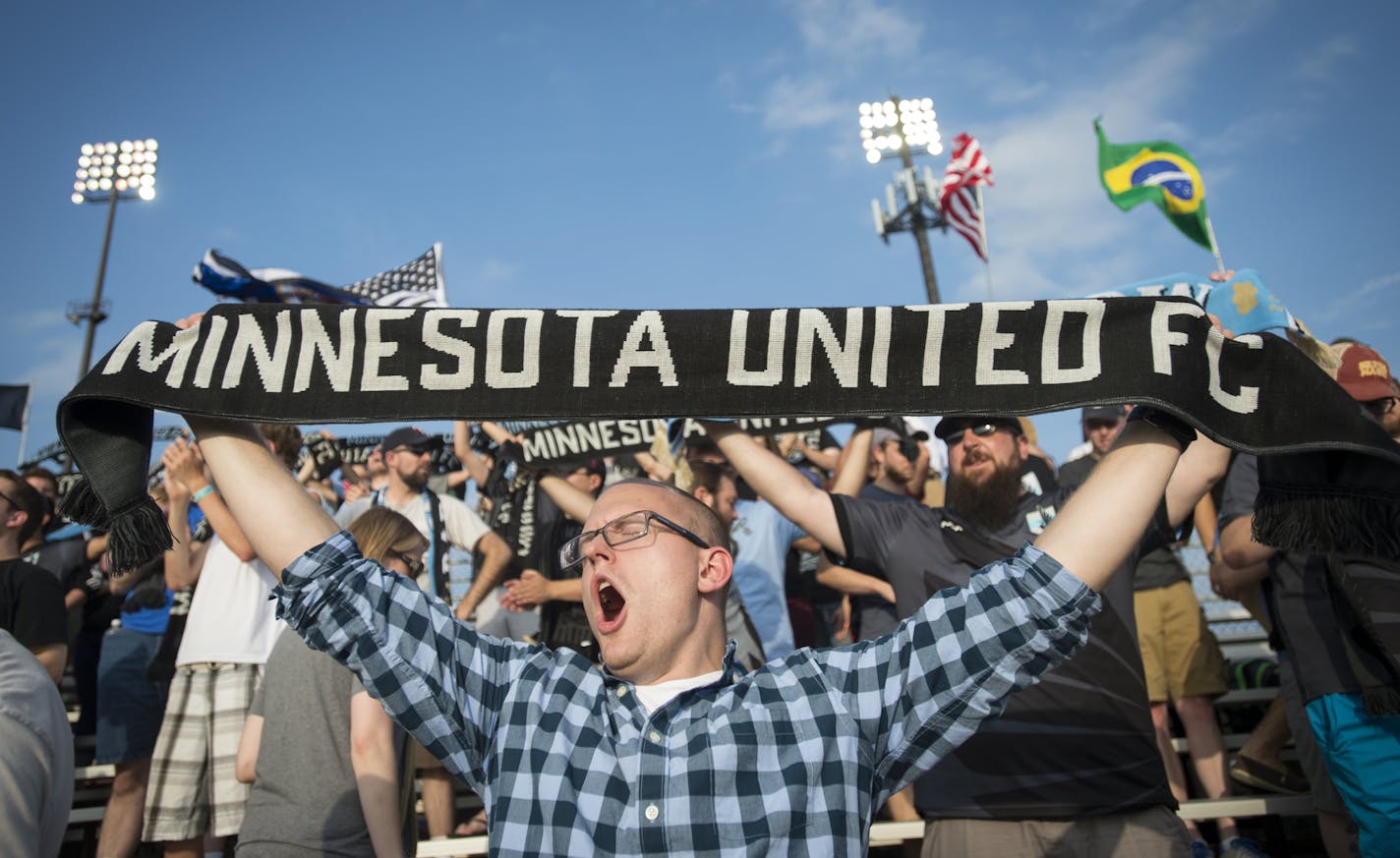 David Martin, of Prior Lake, held up his Minnesota United FC scarf during a match. Minnesota United's future in Major League Soccer, on hold in the wake of a stalled legislative session, appears headed for resolution as early as mid-August.