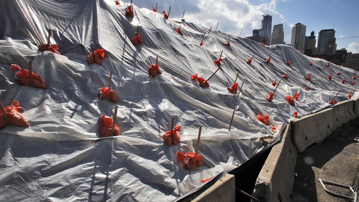 Piles of dirt connected to the building of the new Vikings stadium have been placed on nearby land owned by stadium builder Wilf. ] (MARLIN LEVISON/STARTRIBUNE(mlevison@startribune.com)