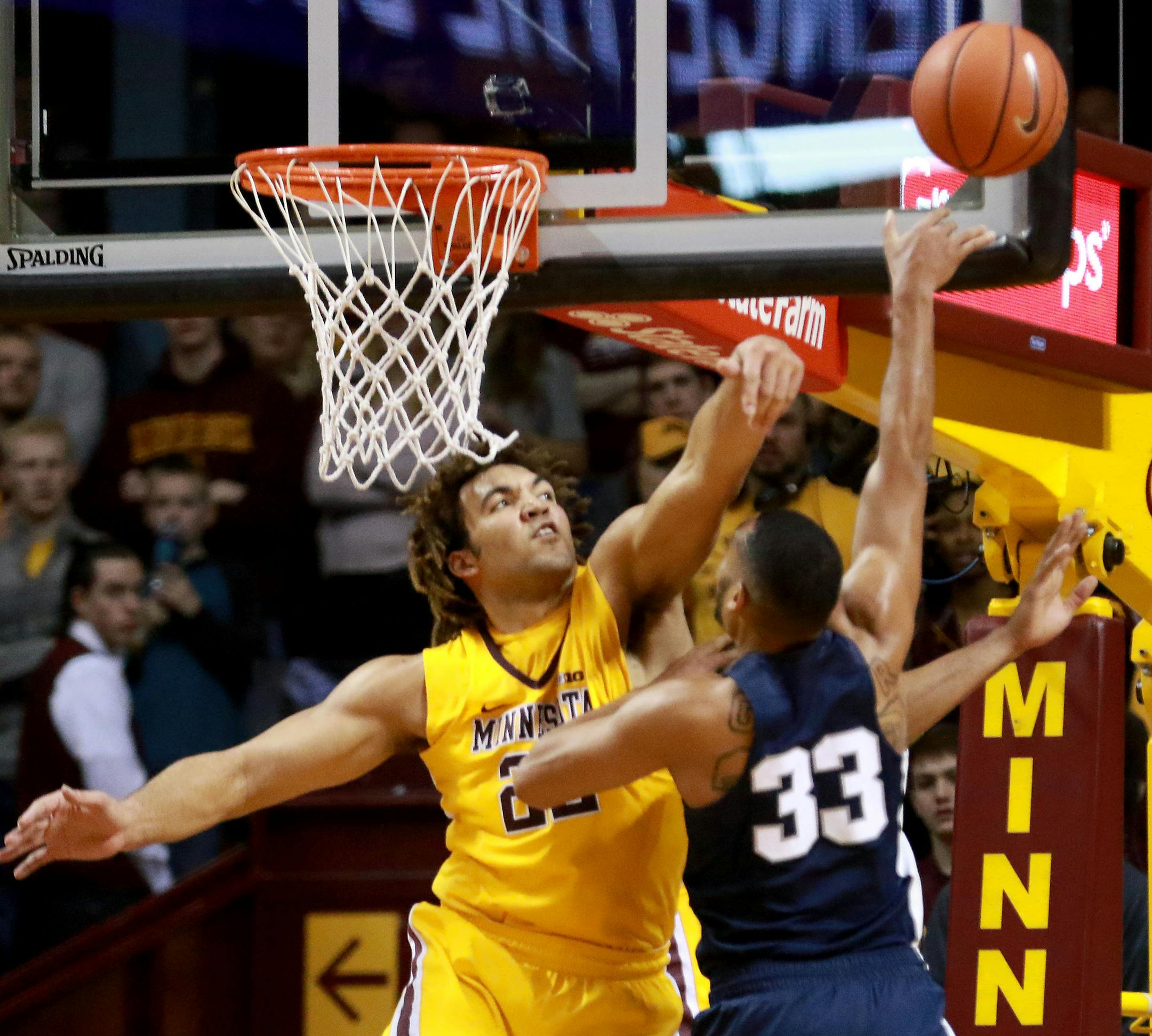 The University of Minnesota's Reggie Lynch (22) set the school's single-season shot block record on this rejection of Penn State's Shep Garner (33) in the second half of the Gopher's 81-71 win Saturday, Feb. 25, 2017, at Williams Arena in Minneapolis, MN.] DAVID JOLES &#x2022; david.joles@startribune.com Gophers vs. Penn State, men's basketball