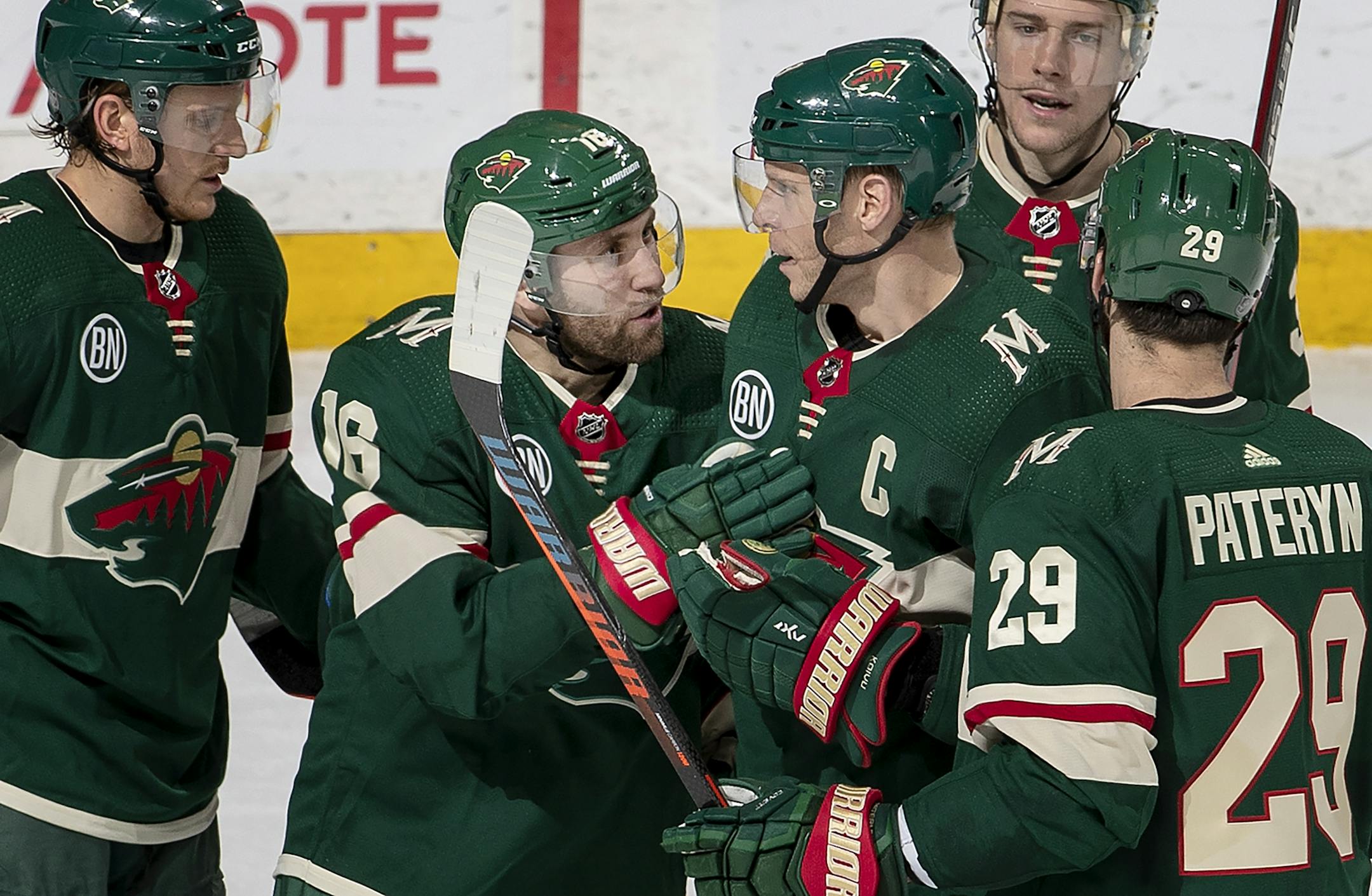 Jason Zucker (16) celebrated with teammates after scoring a power play goal in the second period.